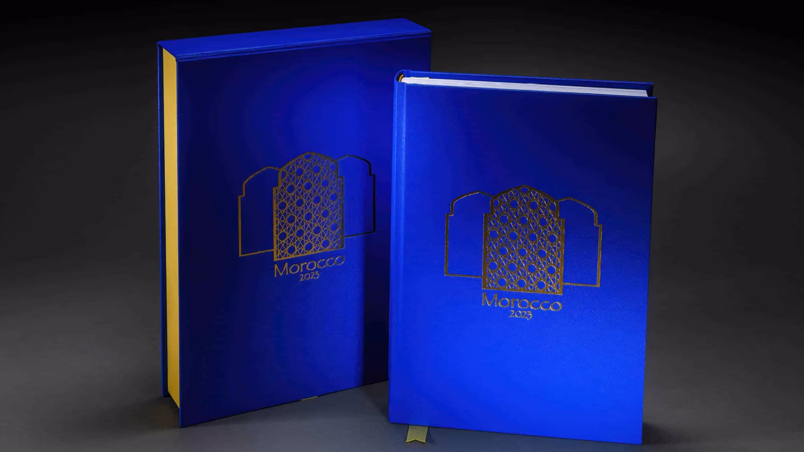 Blue Morocco travel book and matching presentation box with a gold-foiled cover design