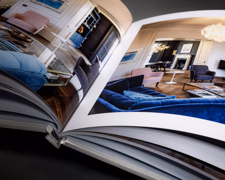 A luxury brand book with a dark finished cover