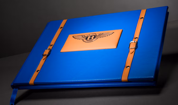 A bespoke automotive book featuring a Bentley