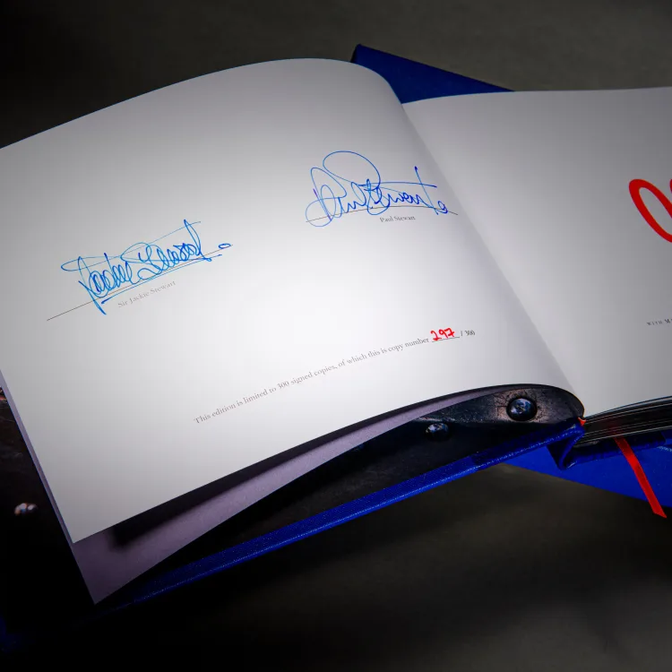 Limited-edition book opened to a signed and individually numbered page