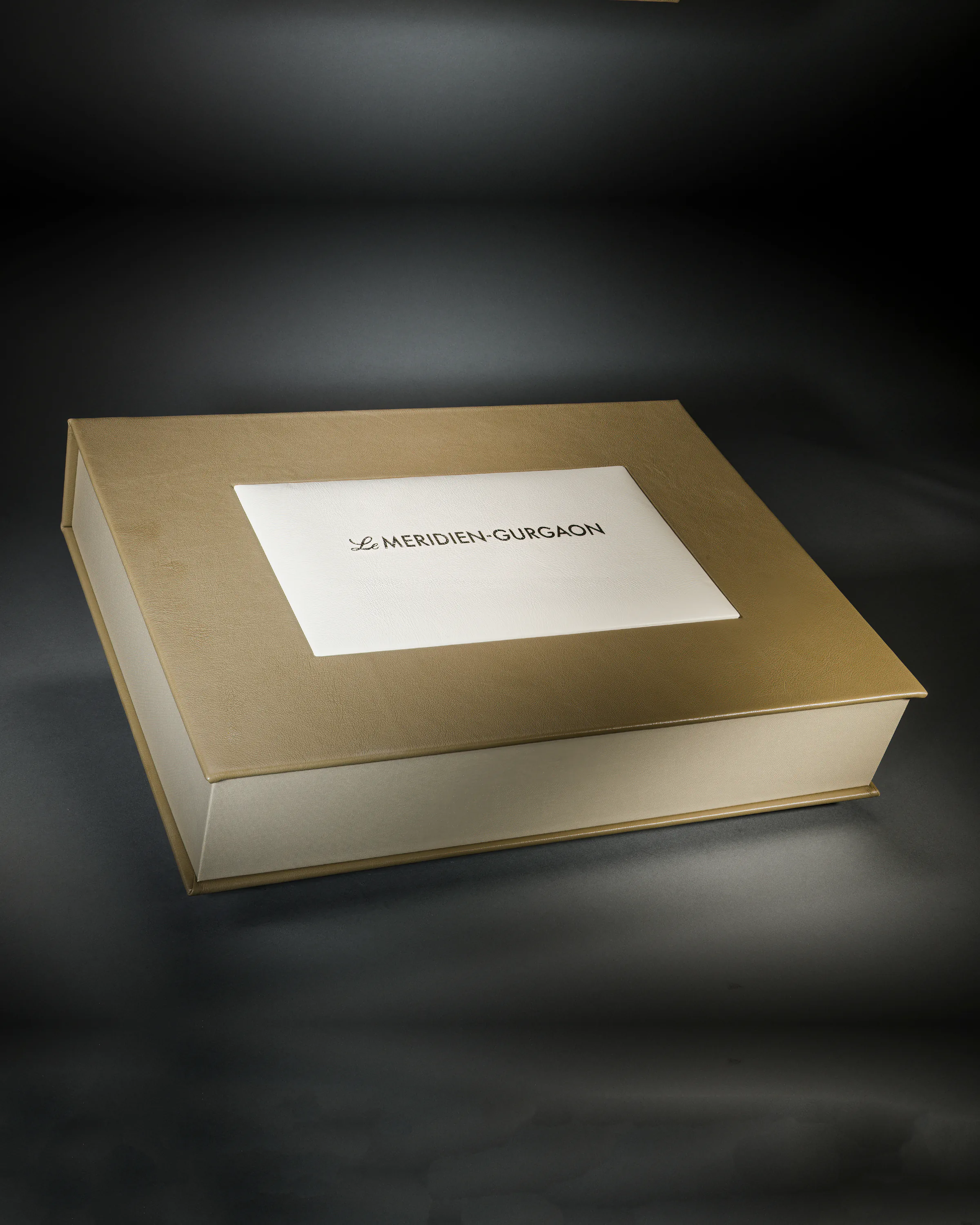 Gold presentation box created for Le Manoir aux Quat Saisons
