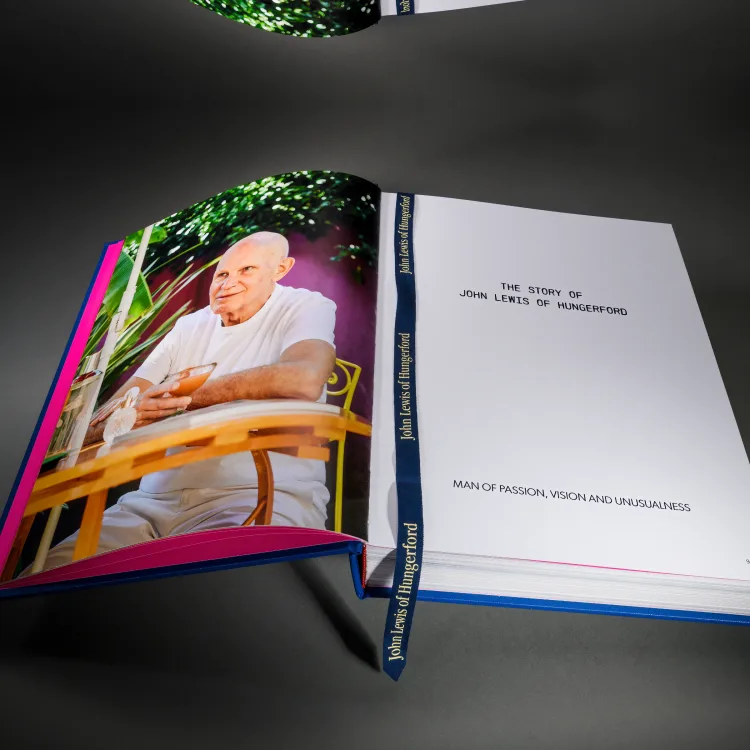 The Story of John Lewis of Hungerford company history book opened to its title page