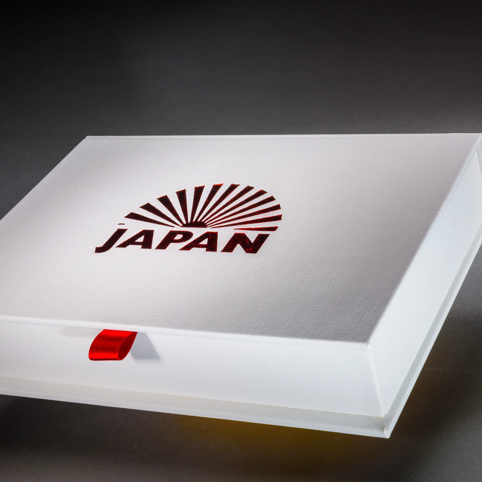 White Japan travel photo book displayed in its presentation box