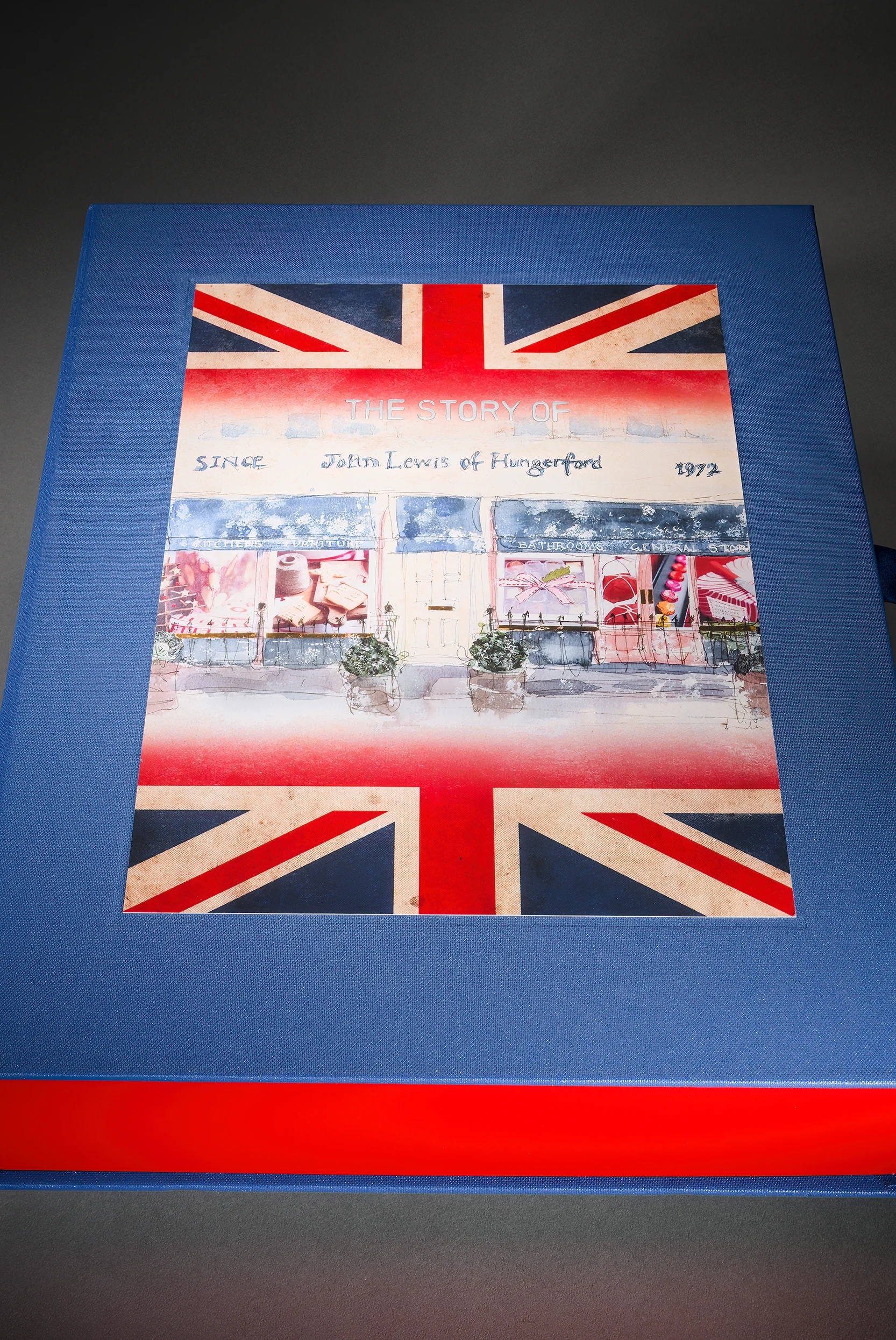 Blue heritage book with a Union Flag John Lewis of Hungerford cover