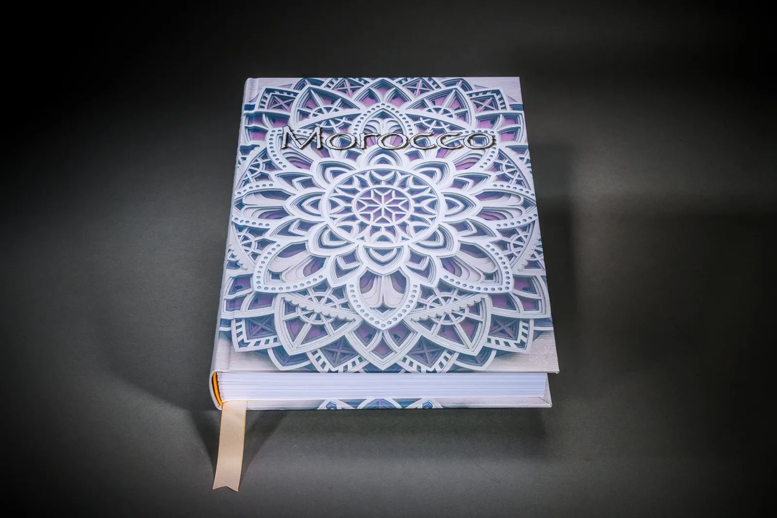 Blue and violet patterned cover of a bespoke photo book