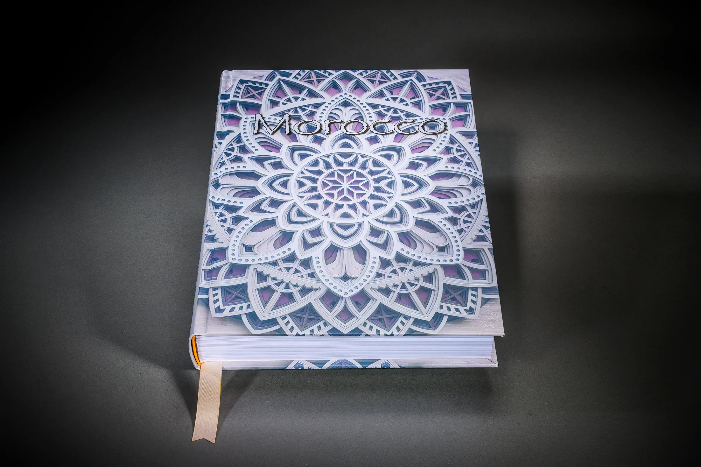 Blue and violet patterned cover of a bespoke photo book