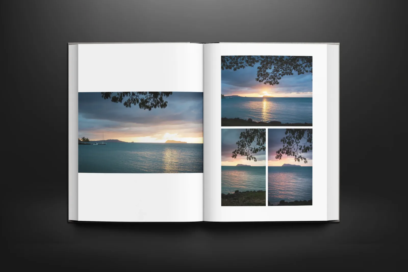 Open photo book showing a coastal sunset across its pages