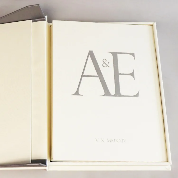 Ivory A and E wedding album displayed inside its matching presentation box