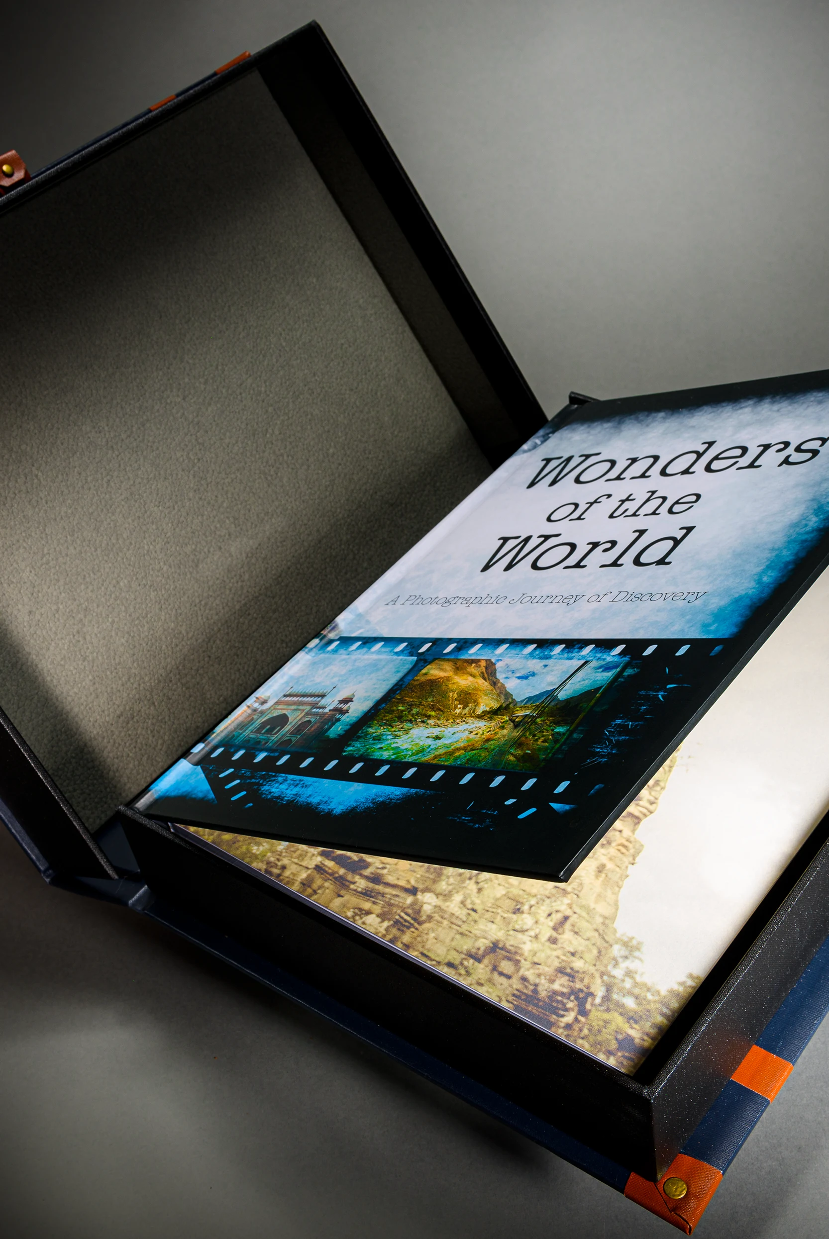 Wonders of the World book in a black presentation case