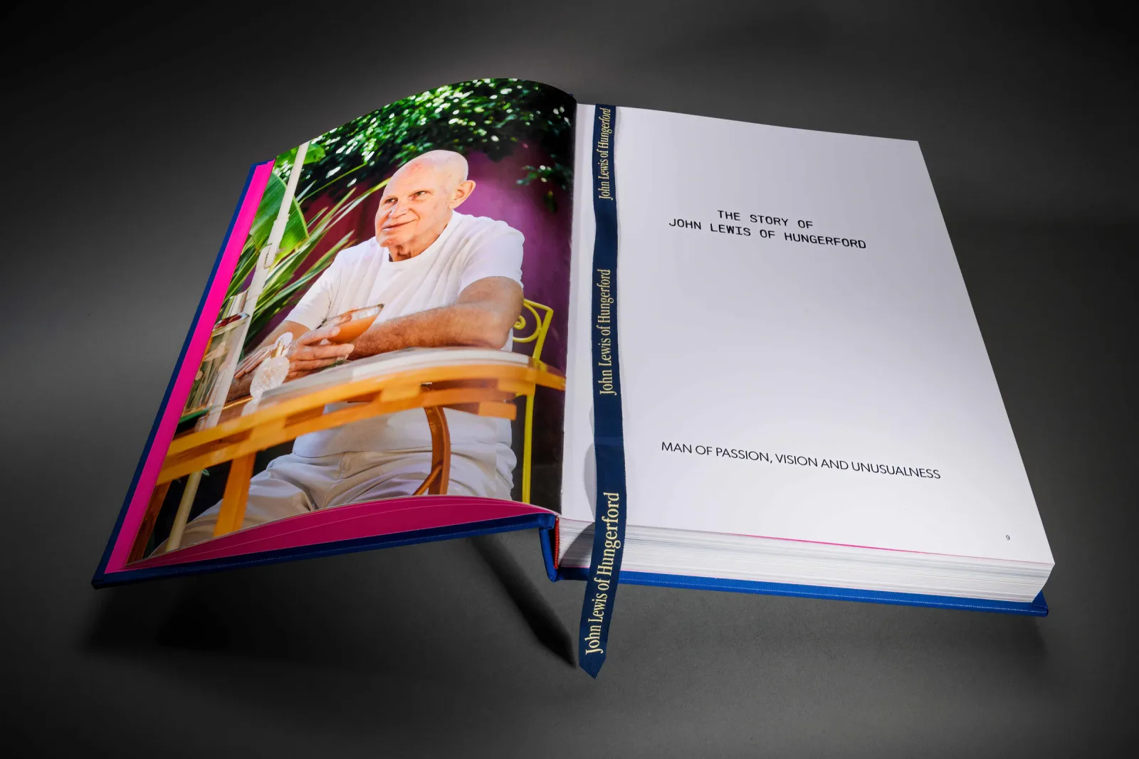 Open bespoke story book with a portrait on the left and a personalised title page on the right